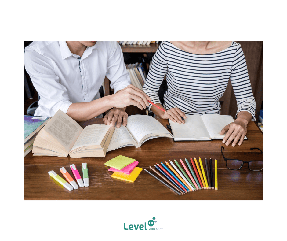 A student having a private in-person tutoring lesson for his upcoming A-level chemistry exams